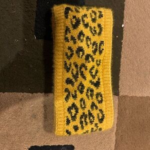 Black and yellow ear warmers